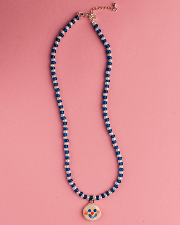 Pansy x Emily Green Ceramic Charm Necklace - White and Turquoise Face