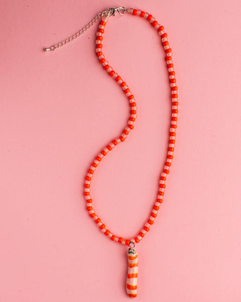 Pansy x Emily Green Ceramic Charm Necklace - Orange Worm 1