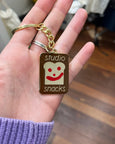Carla McRae - 'Club Studio Snacks' Keychain
